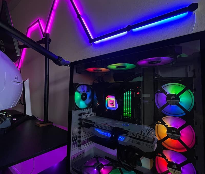 Glowing pink and purple gaming setup for a cozy gaming stream