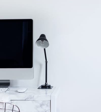 Calm desk with monitor and lamp for a cozy co-working stream