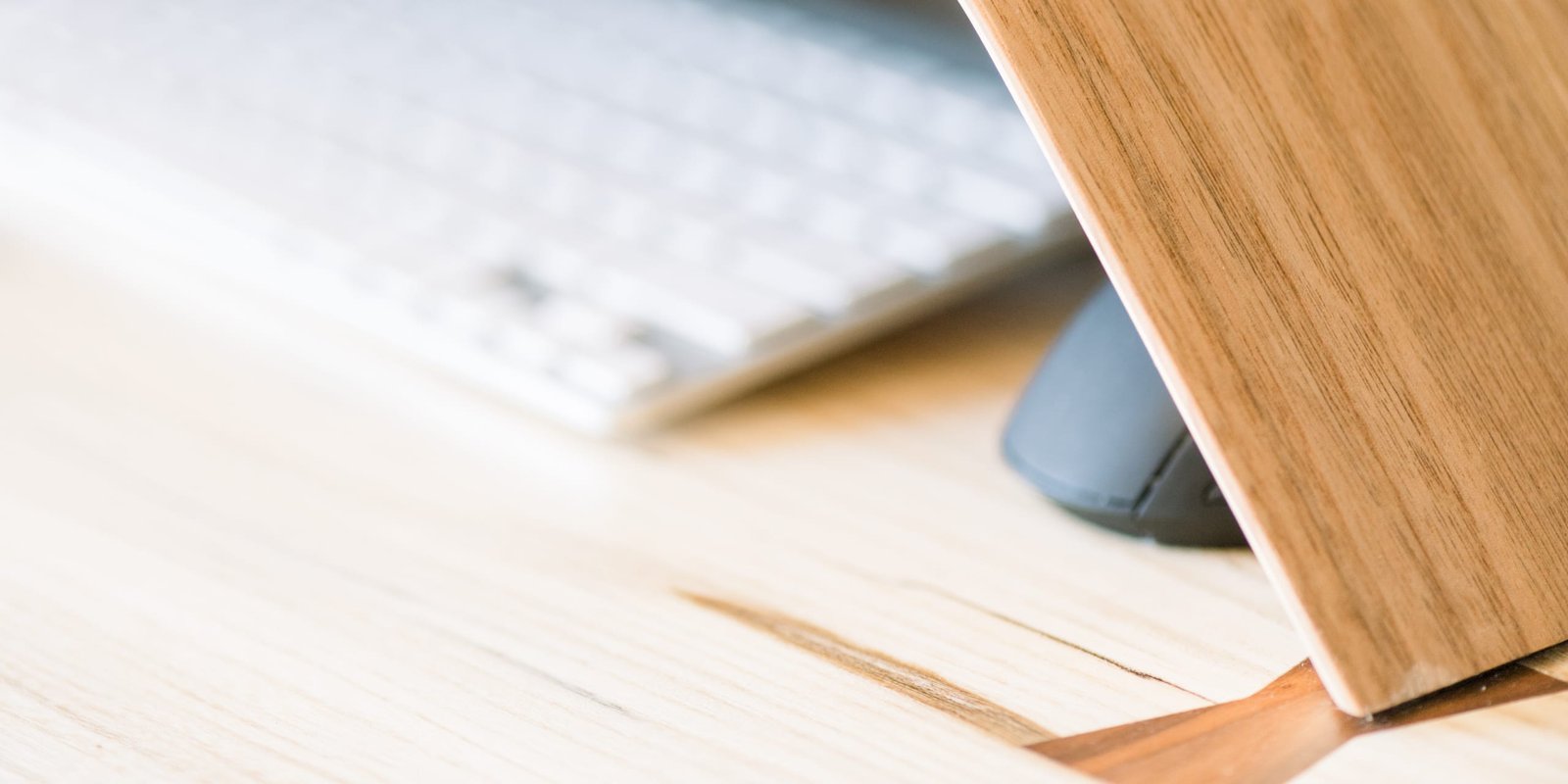 Soft keyboard and warm wood desk details, a few of JustLilyGrace’s favorite cozy things
